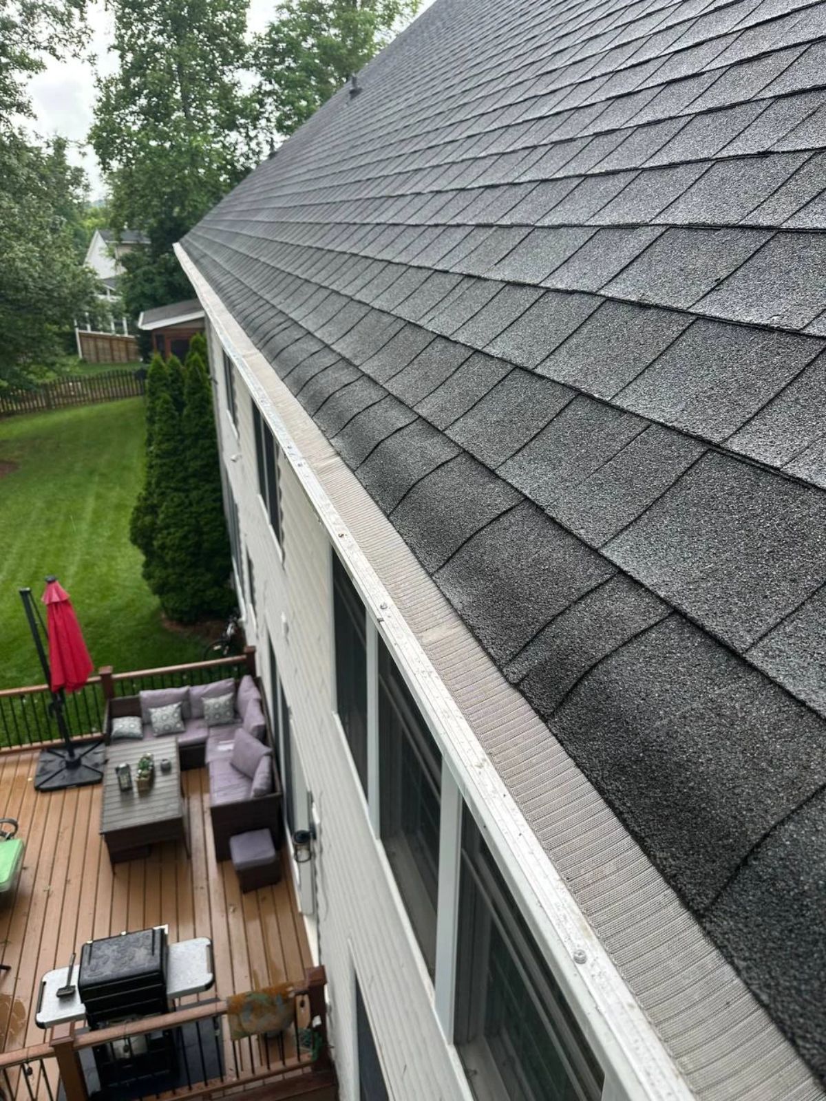 Finished roofline with stainless micro-mesh gutter guards fitted flush in Charlotte NC
